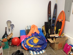 sporting goods and water fun items for sale at hoarding 4 hope garage sale fundraiser