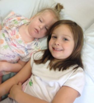 Lily visits little sister Harper in the hospital